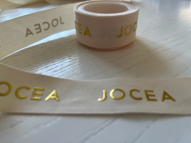Medvilnės juostelė su logotipu