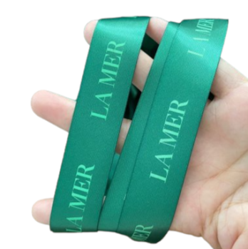 Green ribbon bow with logo