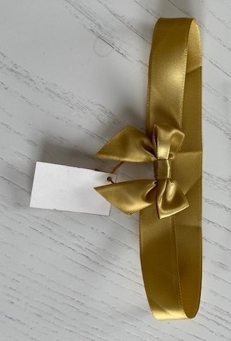 Surišti kaspinėliai greitam dovanų pakavimui su elastine juostele